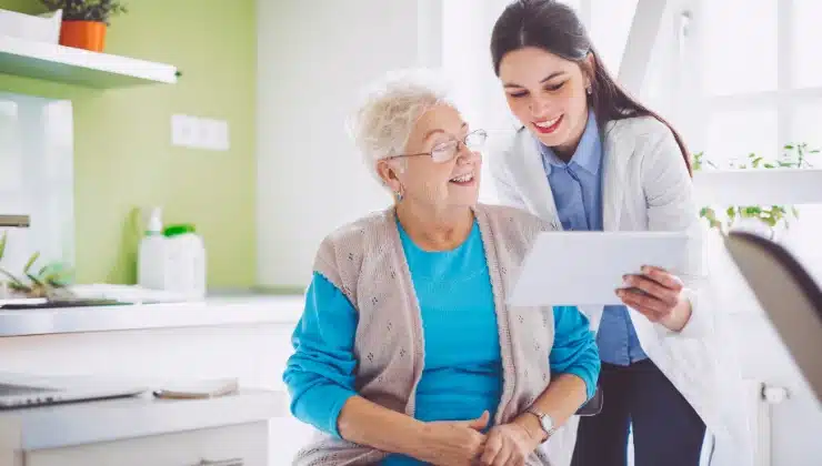 Older adult reviewing test results with a clinician