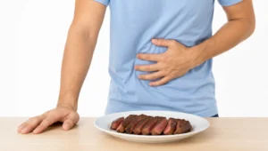 person suffering from GI symptoms caused by alpha gal syndrome