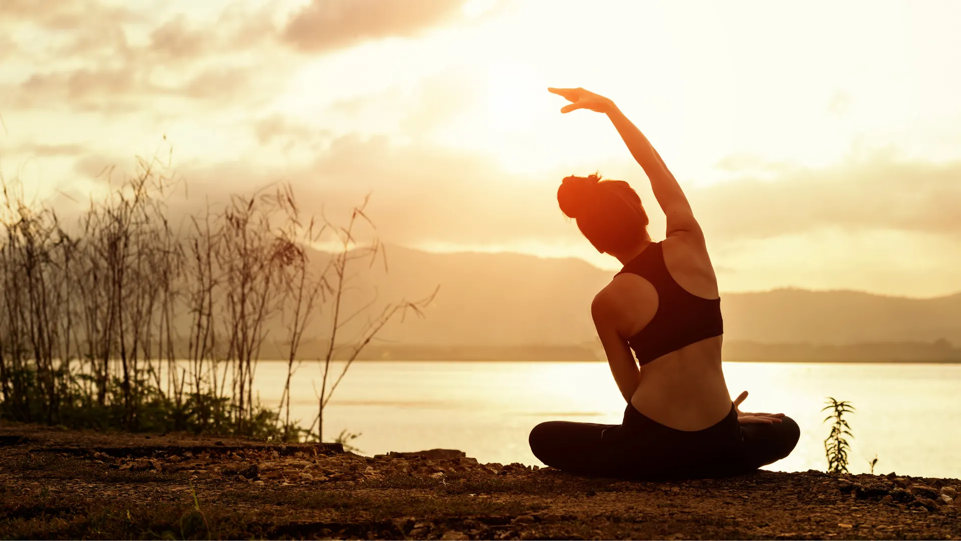 woman doing yoga as supportive fibromyalgia natural treatment